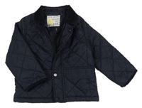 Tmavomodrá šusťáková prošívaná jarní zateplená bunda 