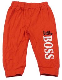 Červené lehké tepláky s nápisem 