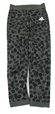 Šedé puntíkaté sportovní legíny s logem Adidas
