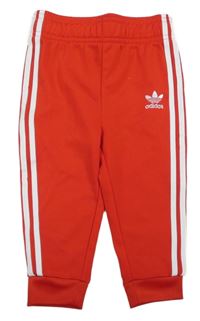 Červené sportovní tepláky Adidas
