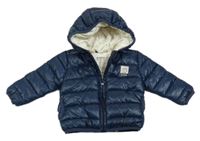 Tmavomodrá šusťáková prošívaná zimní bunda s kapucí Kanz