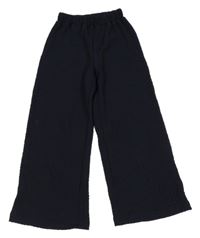 Tmavomodré vzorované culottes nohavice H&M