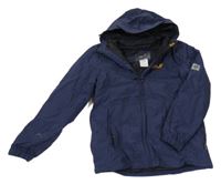 Tmavomodrá šusťáková zimní bunda s kapucí Jack Wolfskin