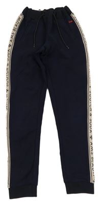 Tmavomodré tepláky s pudrovým pruhom s logy Scotch&Soda