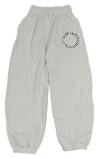 Bílé tepláky s nápisem H&M