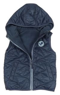 Tmavomodrá prešívaná šušťáková zateplená vesta s dinosaurom a kapucňou St. Bernard