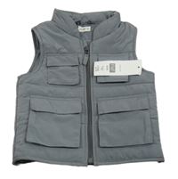 -Nové Sivá šušťáková zateplená vesta F&F