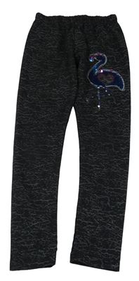 Čierne vzorované legíny s plameňákem z překlápěcích flitrů