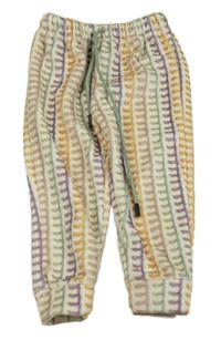 Smetanovo-farebné vzorované plyšové tepláky