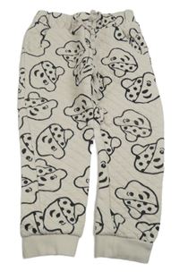 Svělebéžové prošívané tepláky s Pudseym George