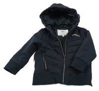 Tmavomodrý prošívaný šusťáková zateplená bunda s nášivkou a kapucí Topolino