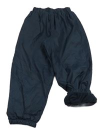 Tmavomodré funkčné šušťákové podšité nohavice Mountain Warehouse