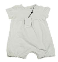 Nové - bílý vzorovaný kraťasový overal M&Co.