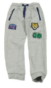 Světlešedé tepláky s obrázky