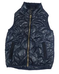 Tmavomodrá šušťáková prešívaná zateplená vesta zn. Next