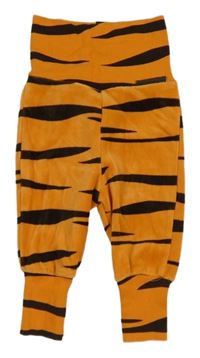 Oranžovo-černé vzorované sametové tepláky H&M