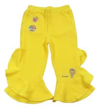 Žluté žebrované kalhoty se zmrzlinami a volány