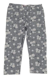 Tmavomodro-biele pruhované capri legíny s kvetinami Topolino