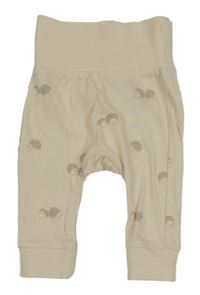 Béžové tepláky s ježečky H&M