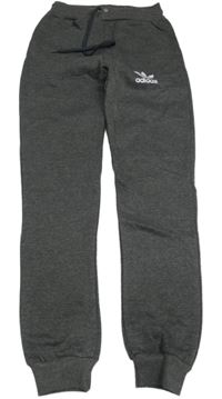 Sivé tepláky s logem Adidas vel.176