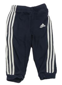 Tmavomodré tepláky s logem Adidas