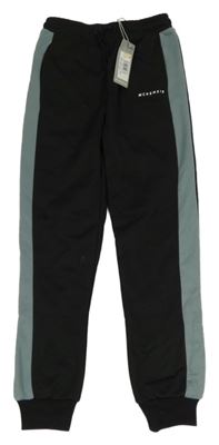 Nové - Čierno-sivé športové nohavice s logom McKenzie