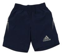 Tmavomodré šusťákové funkční kraťasy Adidas