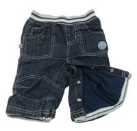 Tmavomodré podšité propínací rifle s úpletovým pasem 