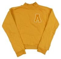 Pomerančová mikina s písmenem M&S