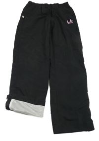 Černé šusťákové sportovní kalhoty s logem LA Gear