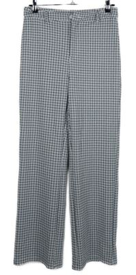 Dámske čierno-biele kockované voľné é nohavice Shein