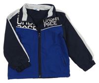 Tmavomodro-modro-biela šušťáková jarná bunda s nápisom Topolino