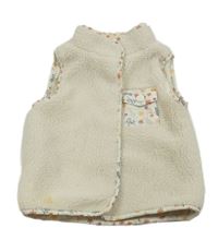 Smotanová huňatá podšitá vesta s kvetmi a větvičkami a vreckom PRIMARK