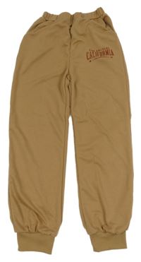 Béžové tepláky s nápisom