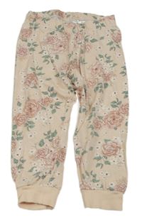 Světlepudrové pyžamové nohavice s růžemi zn. H&M