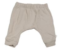 Světlepudrové turecké tepláky Next