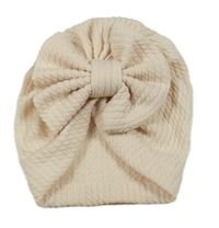 Světlepudrová vzorovaná turbanová čapica s mašlou