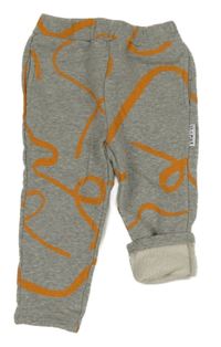 Sivo-oranžové vzorované tepláky