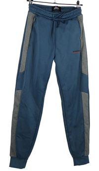 Pánske modrošedé športové tepláky s pruhmi McKenzie