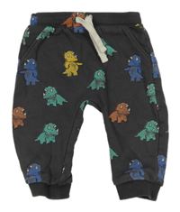 Tmavošedé tepláky s dinosaury M&S
