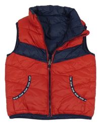 Červeno-tmavomodrá prešívaná šušťáková zateplená obojstranná vesta C&A