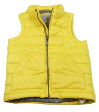Žltá prešívaná šušťáková zateplená vesta RESERVED