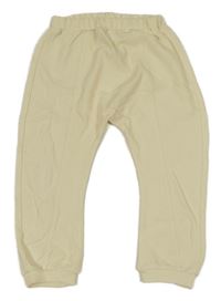 Vanilkové tepláky Next