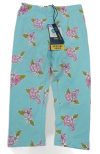 Nové - svetlomodré legíny s kvetinami