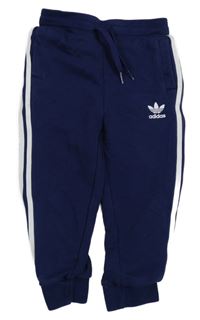Tmavomodré tepláky s logem Adidas