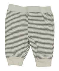 Bílo-černé pruhované tepláky