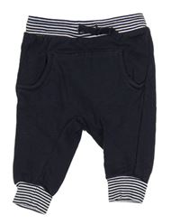 Tmavomodro-biele tepláky s pruhmi H&M