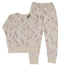 Nové - Svetloružové zamatové pyžama s jednorožcami dunnes