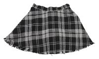 Čierno-biela kockovaná sukňa s všitými kraťasy H&M
