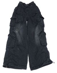 Černé wide leg rifle s kapsami a ošoupaným vzhledem,